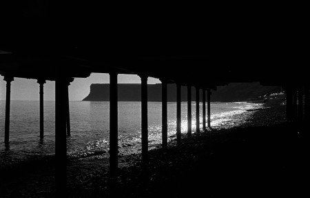 Under Saltburn Pier Photograph by David Eadington ©2025 David Eadington. Contact dave@eadington.co.uk